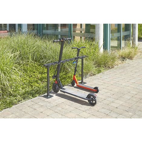 Mottez – Support range 9 trottinettes au sol – Charge maximale 100kg – Peinture antirouille – Dimensions 119x20x59cm – Emplacements pour antivols