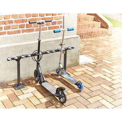 Mottez – Rangement pour 6 trottinettes sur pied – Système antivol par pince – Tube acier carré 30mm – Dimensions 106 x 17,5 x 50cm