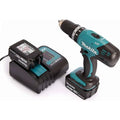Perceuse visseuse à percussion 18v 2 batteries Makita